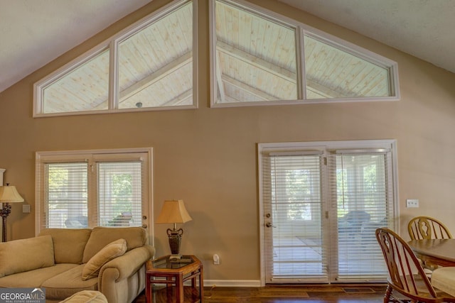 2787 Turtle Cove Trwy, Monticello, GA 31064 - living area with wood finished floors, vaulted ceiling, and baseboards