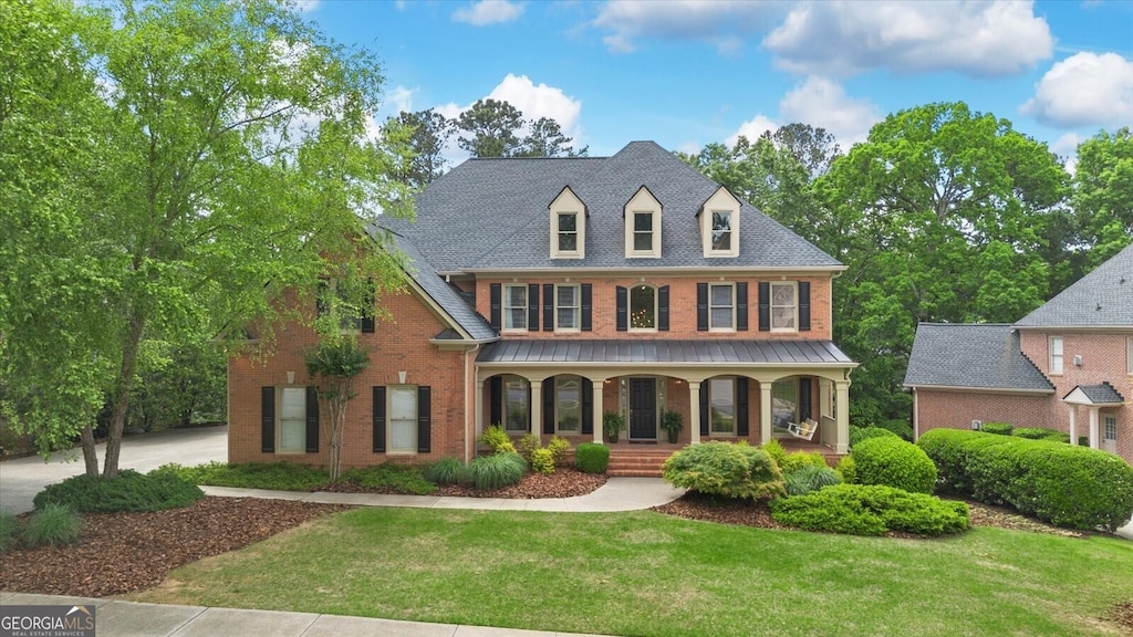 120 Burford Holw, Alpharetta, GA 30022 - view of front of property featuring brick siding, covered porch, and a front yard