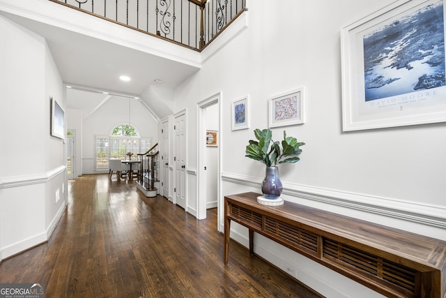 4503 Woodhaven NE, Marietta, GA 30067 - hall with dark wood-type flooring, baseboards, and high vaulted ceiling