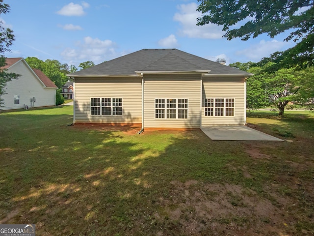 30 Trelawney Ct, Covington, GA 30016 - back of house featuring a patio area and a yard