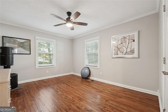2586 Valley Stream Dr, Atlanta, GA 30360 - exercise area featuring wood finished floors, a ceiling fan, and ornamental molding