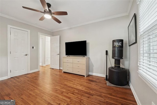 2586 Valley Stream Dr, Atlanta, GA 30360 - living area with wood finished floors, ceiling fan, and crown molding