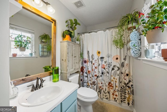 268 Cottonwood Creek Cir, Canton, GA 30114 - bathroom with visible vents, vanity, toilet, tile patterned floors, and a shower with curtain
