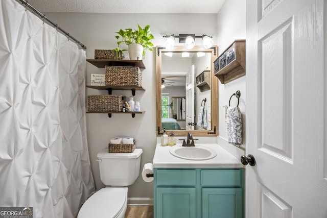 268 Cottonwood Creek Cir, Canton, GA 30114 - ensuite bathroom with vanity, toilet, connected bathroom, a shower with curtain, and a ceiling fan