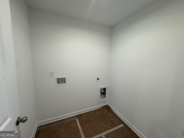 laundry room with laundry area, baseboards, washer hookup, and electric dryer hookup