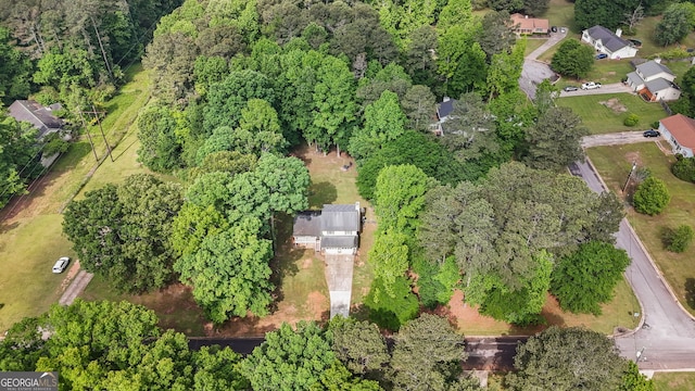 aerial view featuring a view of trees