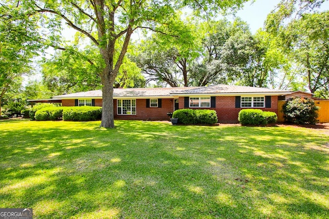 5034 W Ga Highway 292, Collins, GA 30421 - ranch-style home with brick siding and a front yard