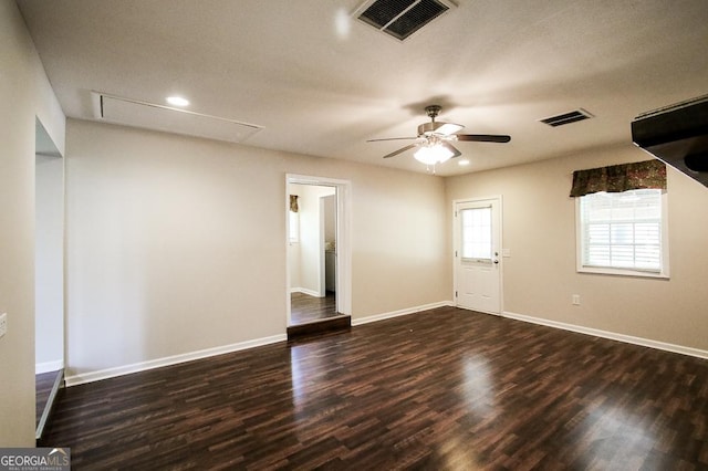 5034 W Ga Highway 292, Collins, GA 30421 - spare room with visible vents, attic access, and wood finished floors