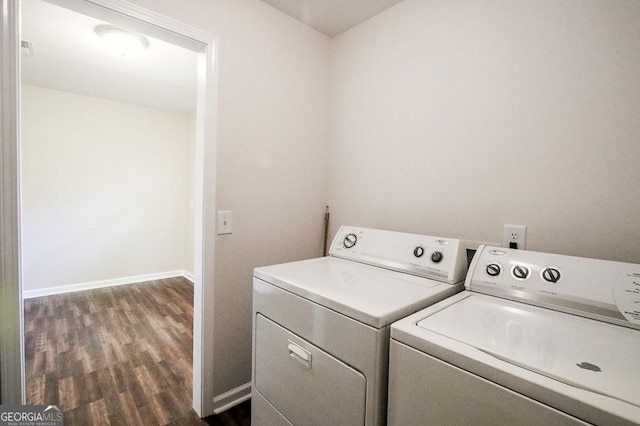 5034 W Ga Highway 292, Collins, GA 30421 - clothes washing area featuring laundry area, baseboards, dark wood-type flooring, and washing machine and dryer