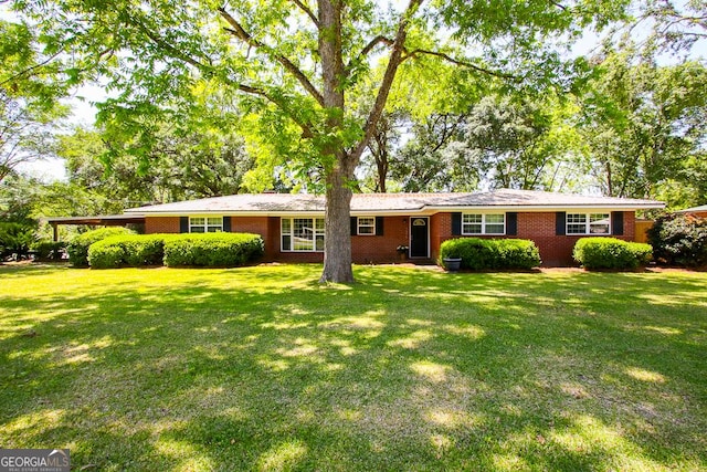 5034 W Ga Highway 292, Collins, GA 30421 - ranch-style house featuring brick siding and a front lawn