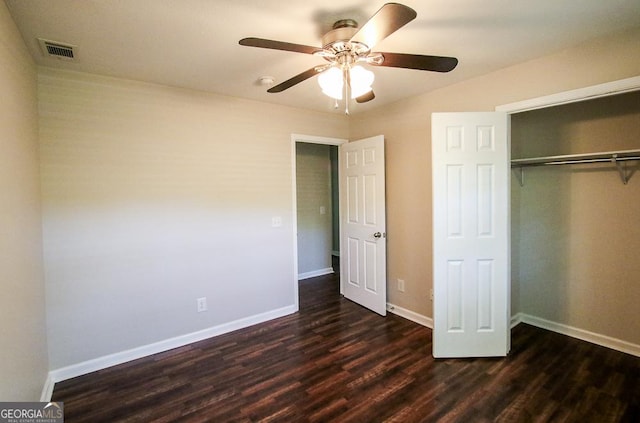 5034 W Ga Highway 292, Collins, GA 30421 - unfurnished bedroom with ceiling fan, baseboards, dark wood-type flooring, visible vents, and a closet
