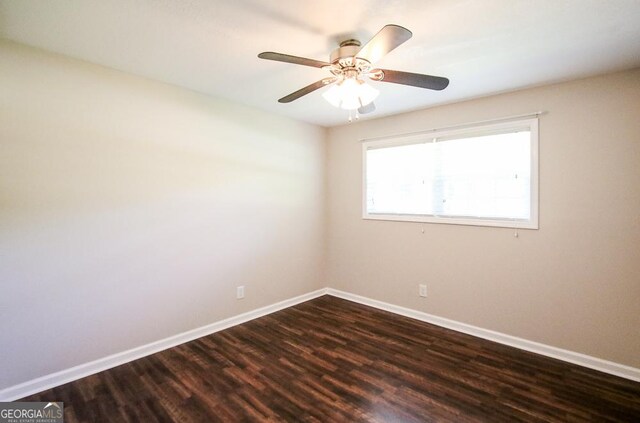 5034 W Ga Highway 292, Collins, GA 30421 - empty room with baseboards, ceiling fan, and dark wood-style floors