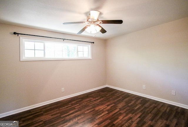 5034 W Ga Highway 292, Collins, GA 30421 - empty room with baseboards, a ceiling fan, and dark wood-type flooring