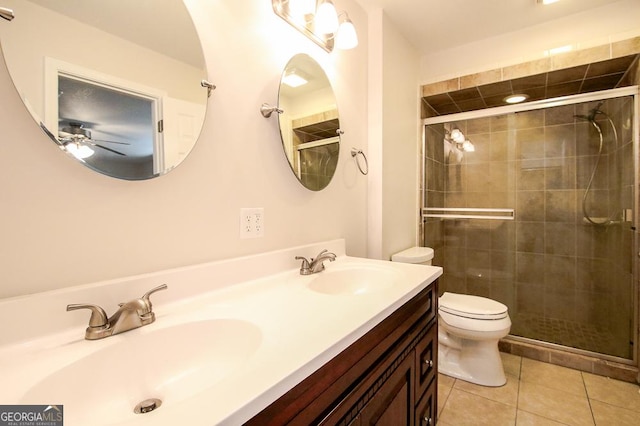 5034 W Ga Highway 292, Collins, GA 30421 - full bath featuring toilet, ceiling fan, a sink, and tile patterned flooring