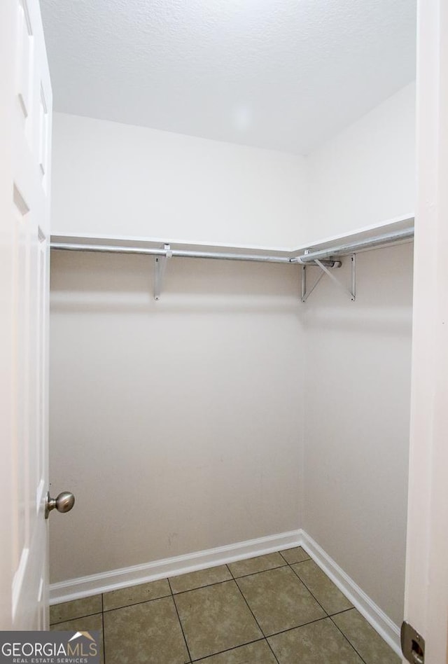 5034 W Ga Highway 292, Collins, GA 30421 - walk in closet with tile patterned flooring