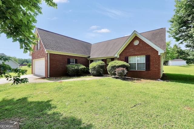 ranch-style home with brick siding, roof with shingles, a front yard, and concrete driveway