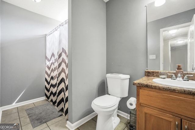 full bathroom with tile patterned flooring, vanity, toilet, baseboards, and curtained shower