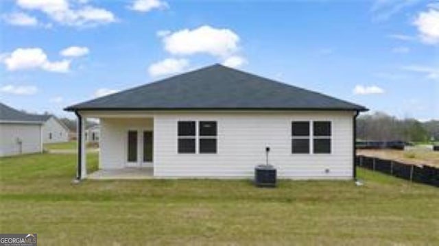 1406 Adirondac Way, Bonaire, GA 31005 - rear view of house with a lawn, a patio, and central AC unit