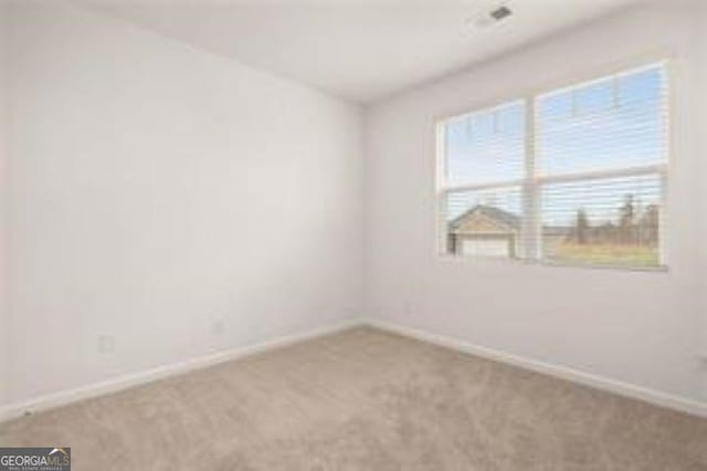 1406 Adirondac Way, Bonaire, GA 31005 - empty room with baseboards and carpet