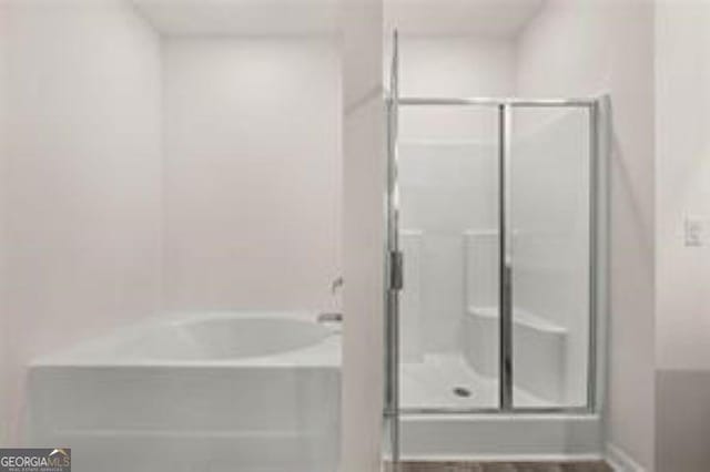 1406 Adirondac Way, Bonaire, GA 31005 - full bathroom featuring a shower stall and a garden tub