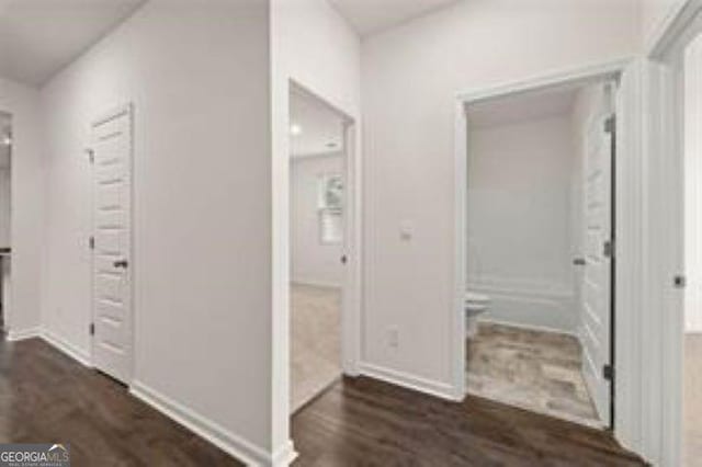 1406 Adirondac Way, Bonaire, GA 31005 - hallway with baseboards and dark wood finished floors