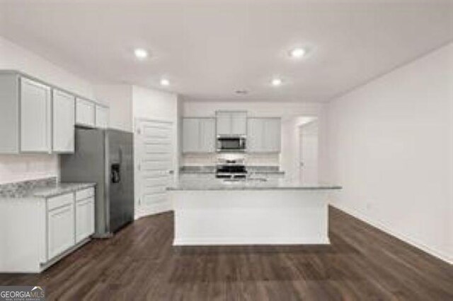 1406 Adirondac Way, Bonaire, GA 31005 - kitchen featuring backsplash, dark wood-style flooring, appliances with stainless steel finishes, light countertops, and recessed lighting