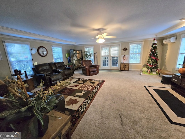 carpeted living room featuring crown molding, a ceiling fan, and an AC wall unit