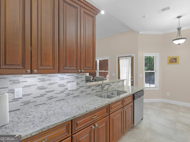 kitchen featuring stainless steel dishwasher, decorative backsplash, visible vents, light stone counters, and a sink