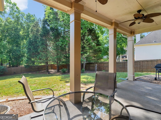 view of patio / terrace with ceiling fan and a fenced backyard