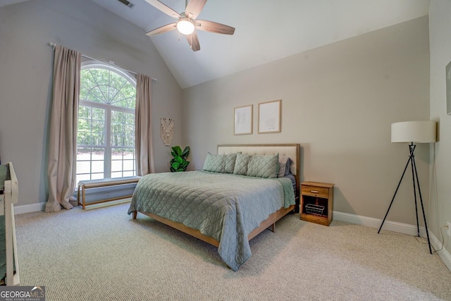 bedroom with carpet, vaulted ceiling, baseboards, and a ceiling fan