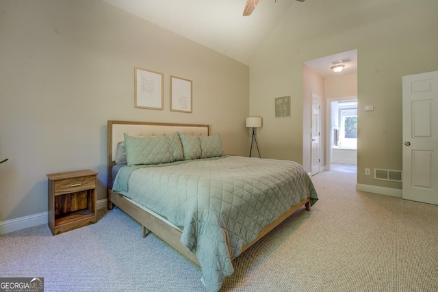 carpeted bedroom featuring lofted ceiling, baseboards, and a ceiling fan