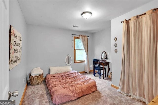 143 Navajo Trl, Rydal, GA 30171 - bedroom with carpet flooring and baseboards