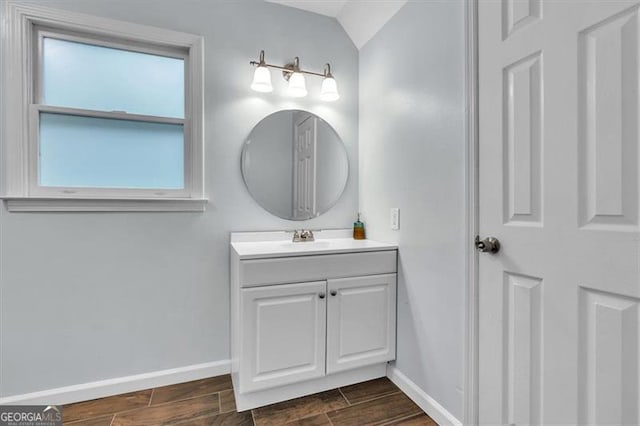143 Navajo Trl, Rydal, GA 30171 - bathroom with baseboards, wood finish floors, and vanity