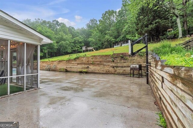 143 Navajo Trl, Rydal, GA 30171 - view of patio / terrace featuring a sunroom