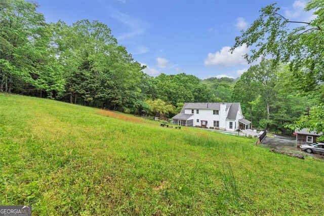 143 Navajo Trl, Rydal, GA 30171 - view of grassy yard featuring a view of trees