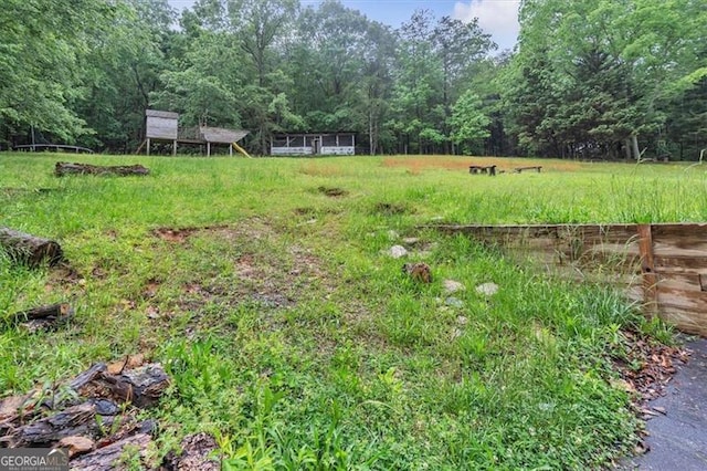 143 Navajo Trl, Rydal, GA 30171 - view of yard featuring a forest view