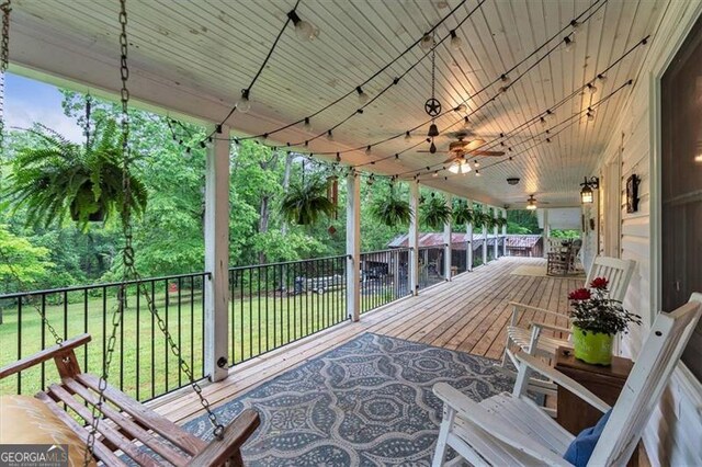 143 Navajo Trl, Rydal, GA 30171 - deck with a ceiling fan and a yard