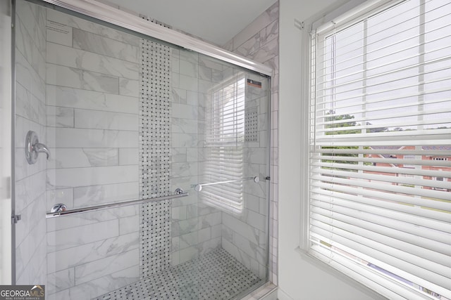 bathroom featuring a stall shower