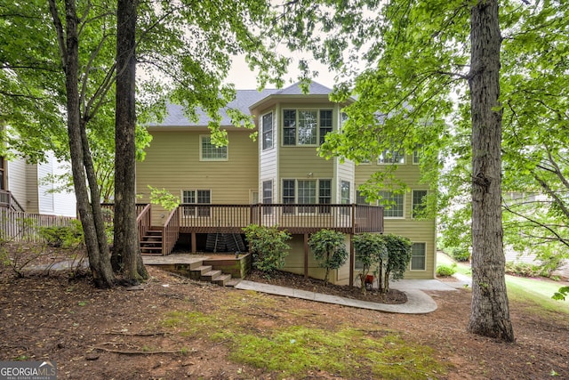 exterior space featuring a deck and stairway