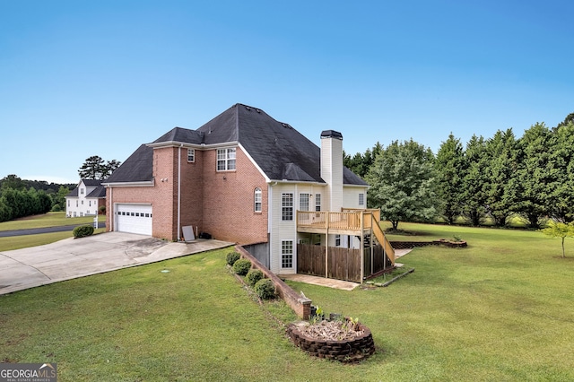 view of home's exterior featuring concrete driveway, a deck, brick siding, and a lawn
