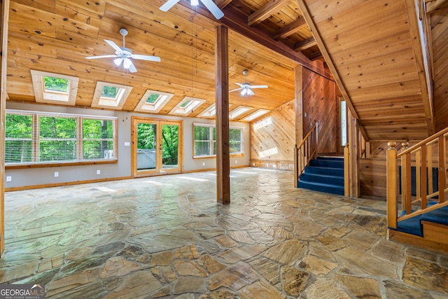 339 Ben Loudermilk Rd, Mount Airy, GA 30563 - unfurnished living room with stone floors, stairs, wooden ceiling, and a ceiling fan
