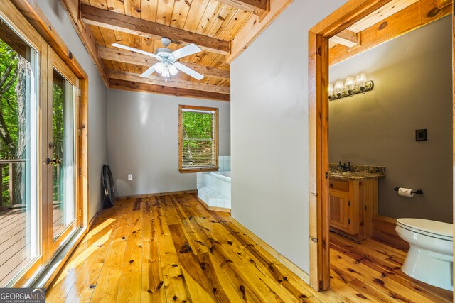 339 Ben Loudermilk Rd, Mount Airy, GA 30563 - hallway with wooden ceiling, beamed ceiling, hardwood / wood-style floors, and baseboards