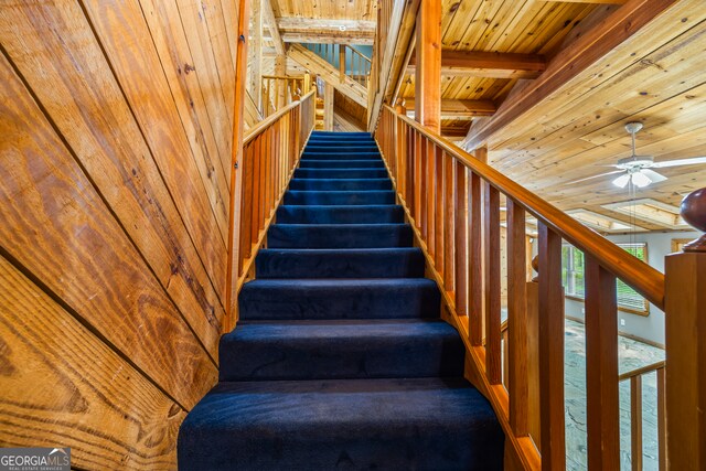 339 Ben Loudermilk Rd, Mount Airy, GA 30563 - stairway with a ceiling fan, wood ceiling, and carpet