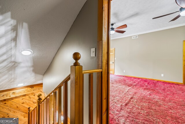 339 Ben Loudermilk Rd, Mount Airy, GA 30563 - interior space featuring a textured ceiling, ornamental molding, visible vents, ceiling fan, and carpet flooring