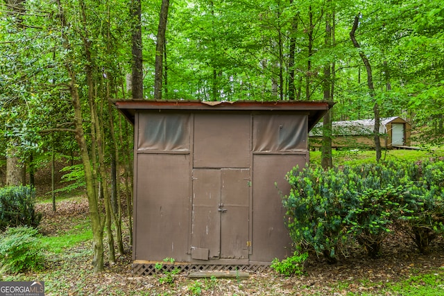 339 Ben Loudermilk Rd, Mount Airy, GA 30563 - view of shed featuring a view of trees