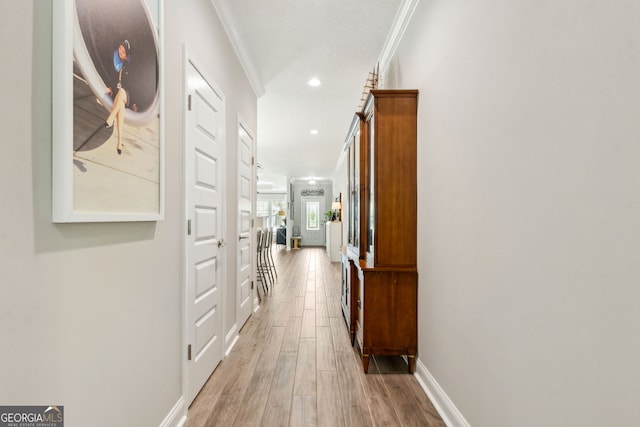 107 Amanda Trce, Kingsland, GA 31548 - corridor with crown molding, light wood finished floors, baseboards, and recessed lighting