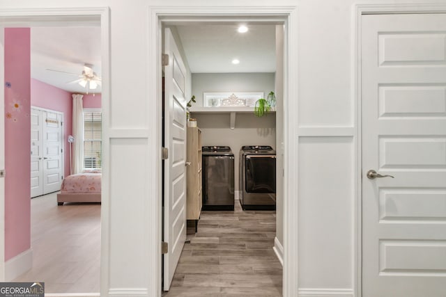 107 Amanda Trce, Kingsland, GA 31548 - corridor featuring washer and dryer, light wood-style floors, recessed lighting, and baseboards