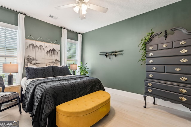 107 Amanda Trce, Kingsland, GA 31548 - bedroom with wood finished floors, a ceiling fan, and baseboards