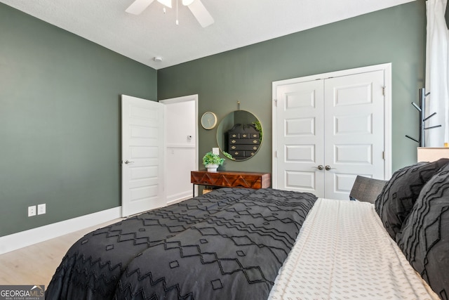 107 Amanda Trce, Kingsland, GA 31548 - bedroom featuring a closet, wood finished floors, a ceiling fan, and baseboards