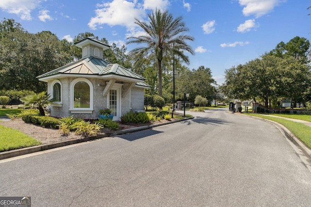 107 Amanda Trce, Kingsland, GA 31548 - view of asphalt road with curbs and sidewalks